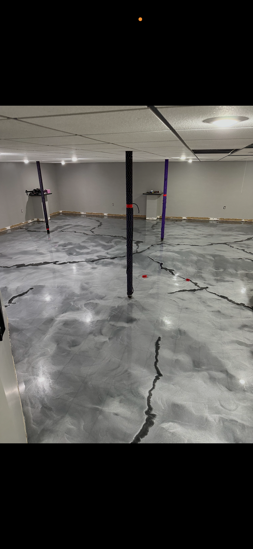 Silver Marble Metallic Epoxy Finished Basement