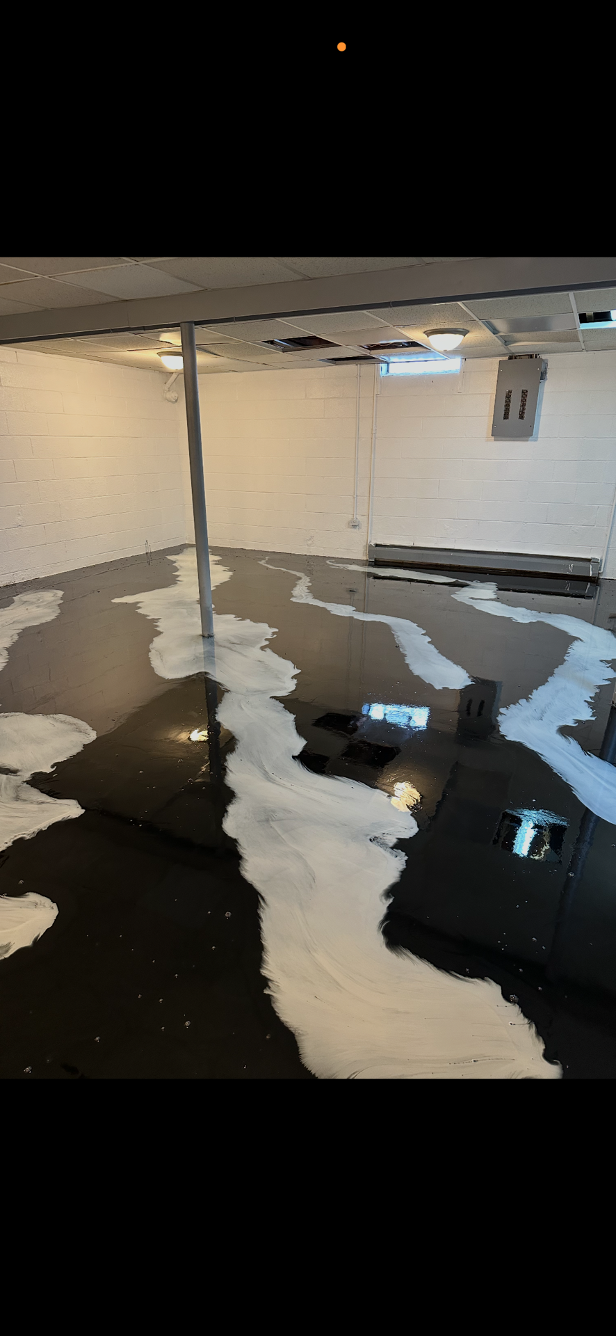 Black and White Metallic Epoxy Basement Application
